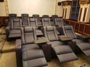 Home Theater Luxury Leather recliners with cup holder and table